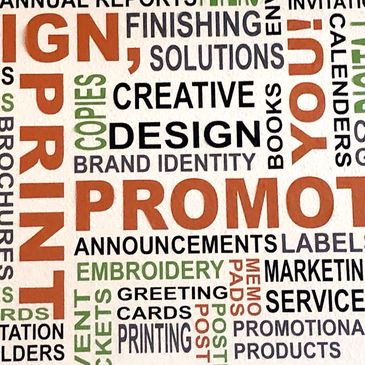 Colorful word cloud on printing, design, and marketing services on a wall.