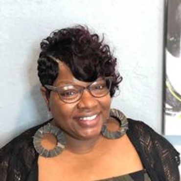 Desoto/Dallas Texas Hairstylist quick weave shoe hairstyles. asymmetrical cut. Tapered on one side