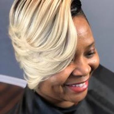 De Soto Texas hairstylist given a client good hair day this diva style is created with blonde hair s
