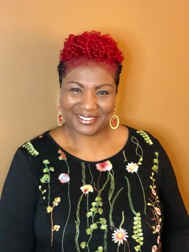 Dallas/ Desoto Texas hair stylist. Red hair color with a jazzy hair cut natural hairstylist. Flexi