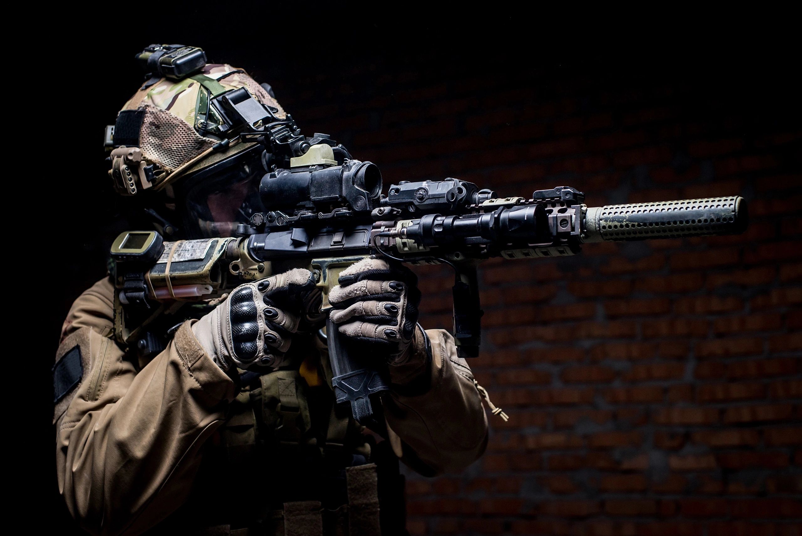 Tactical team member with an AR rifle