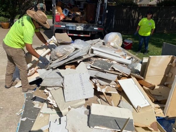 Saiyan junk removal crew at a job site