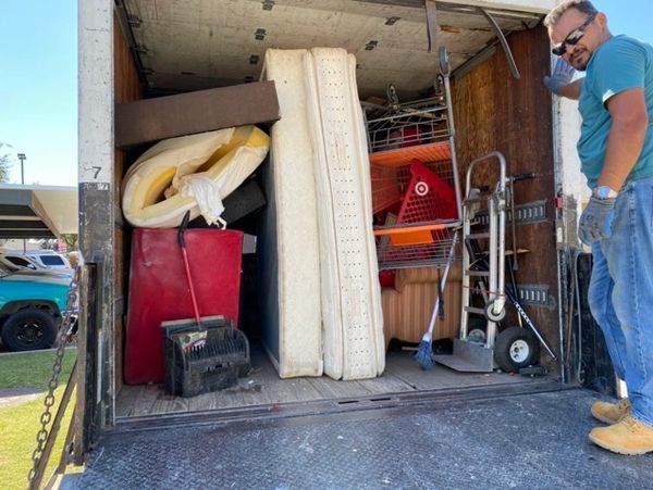 Saiyan crew member with a full load in our box truck