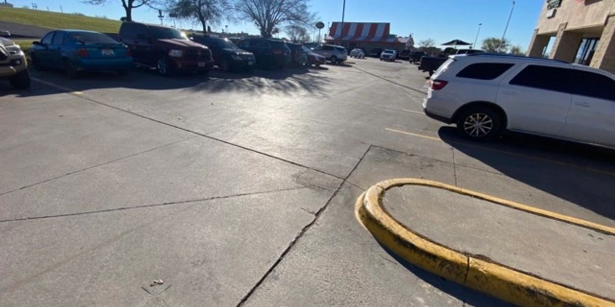 Commercial parking lot sweep services