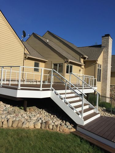 Trex 2-Tone Deck with Azek Fascia and Custom Aluminum and Cable Railing