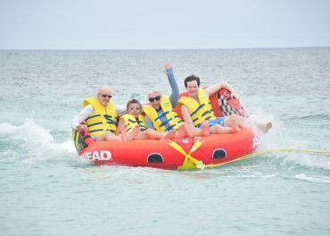 Family tubing on vacation at Sandals in Jamaica
