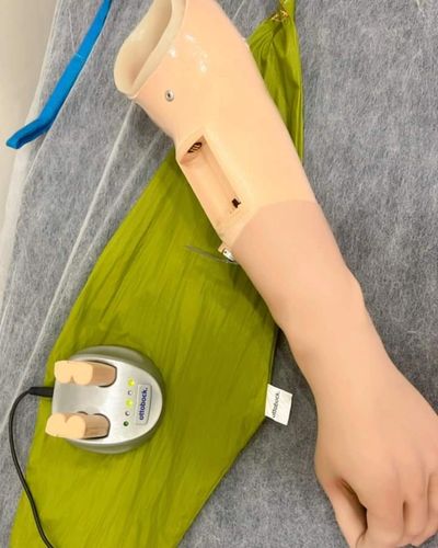 A prosthetic arm with a charging device on a green cloth. Active Prosthetic Feet active prosthetic feet
amputee care, lower limb prosthetics, Ossur amputee care, prosthetic solutions, upper limb prosthetic