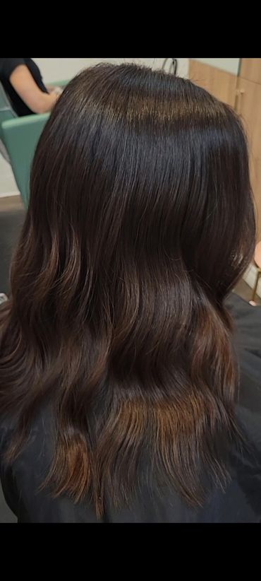 Blended rich brunette, lowlights and gloss is all she'llneed to maintain