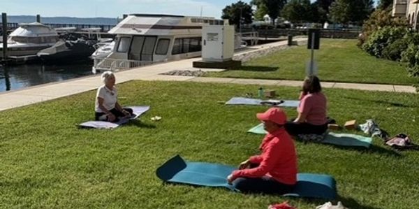 Bayside yoga out front Willow Grace Yoga at Penns Marina in Heron Harbor