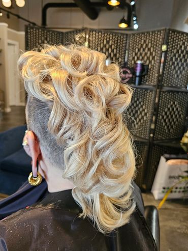 Fun hair cut and hair color, with beautiful hair styling