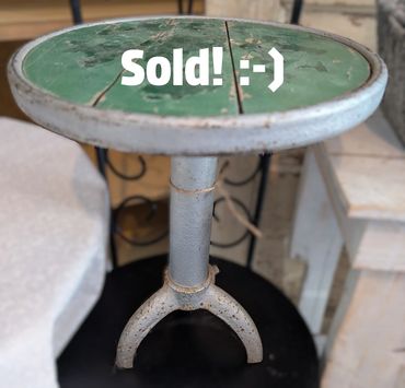 green painted industrial stool