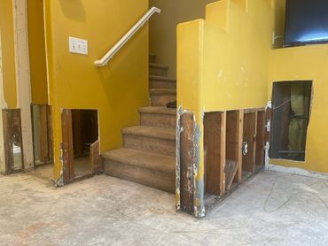 drywall damage on stairway