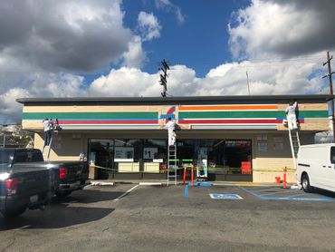 Exterior painting of a Seven Eleven store