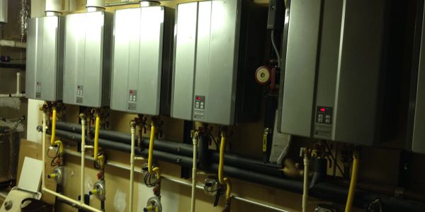 commercial tank-less water heating system