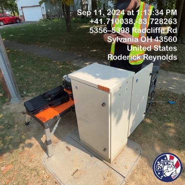 Splicing fiber at the fiber cabinet (hub).