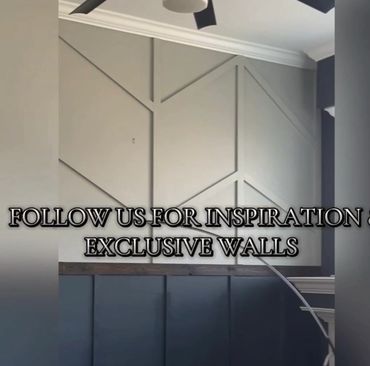 Modern geometric wall design in a cozy room corner with gray tones.