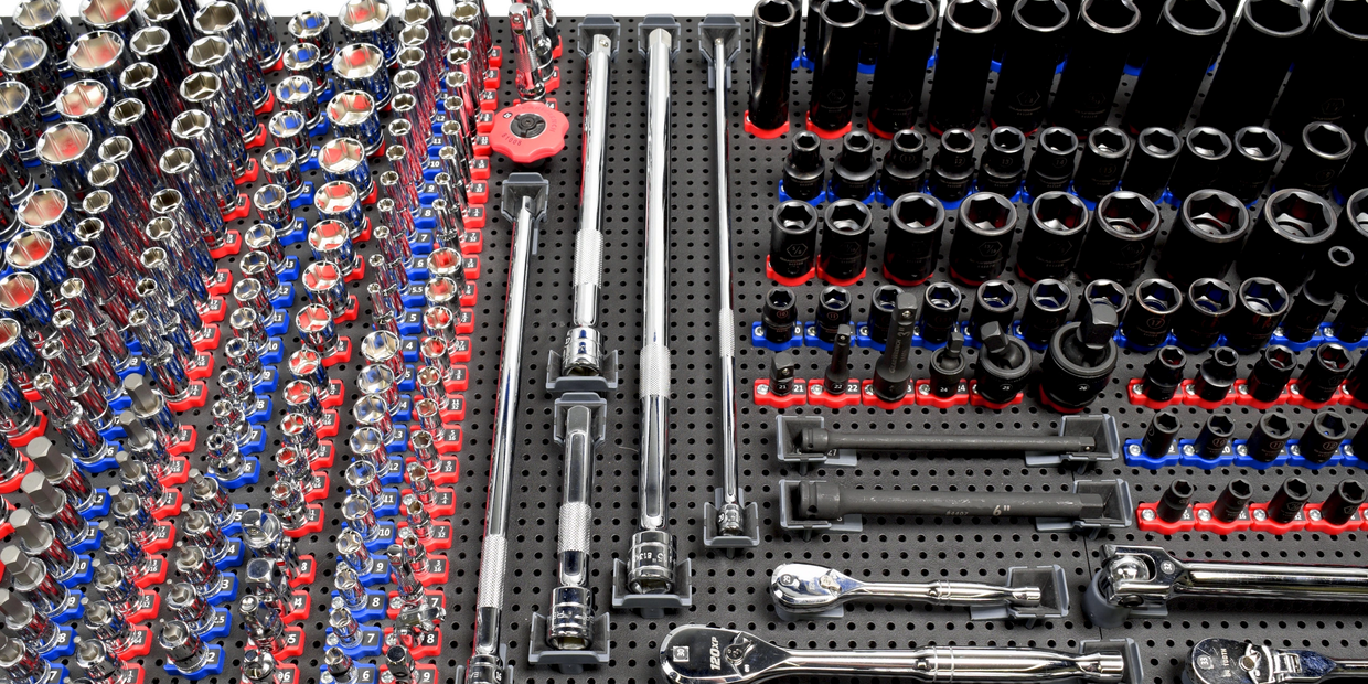tool grid socket and ratchet holders holding tools on a tool grid board