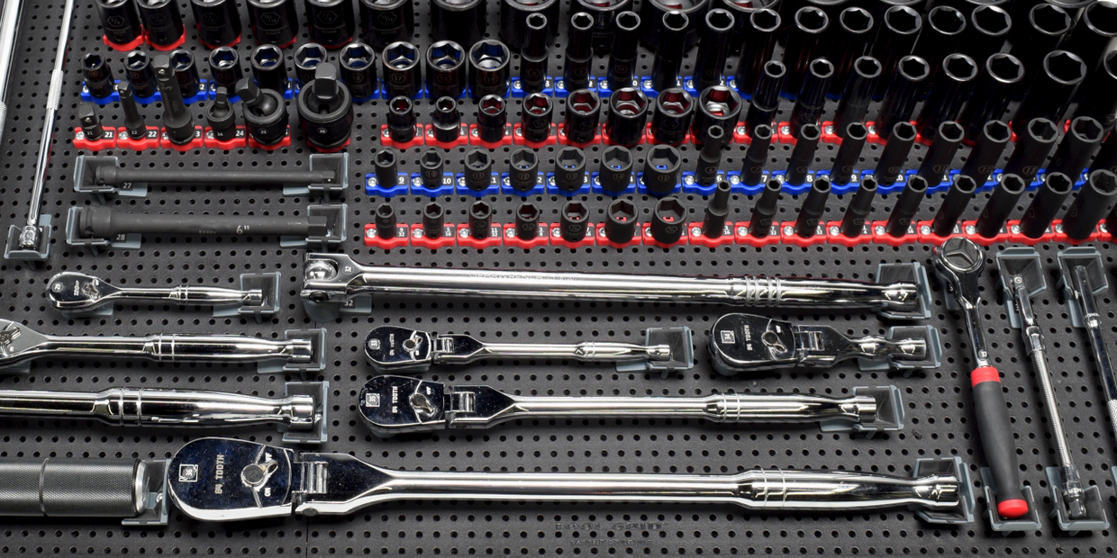 tool grid ratchet and socket holders on a tool grid board holding tools