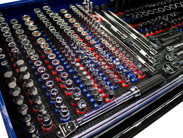 tool box drawer open with tool grid socket and ratchet holders holding tools on a tool grid board