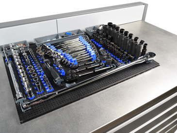 tool box with tool grid and tools on the very top of  the tool box