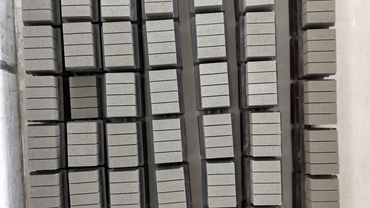 Rows of uniform grey concrete blocks.