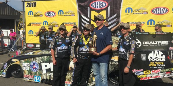 Art Tucker with NHRA Legend John Force after his 2018 win at Mile High Nationals