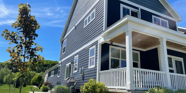 Exterior painting in Traverse City, MI by Full Spectrum Coatings.