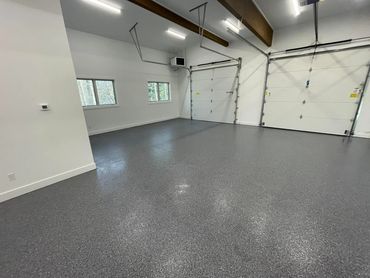 Garage epoxy floor installed in Traverse City, MI by Full Spectrum Coatings.
