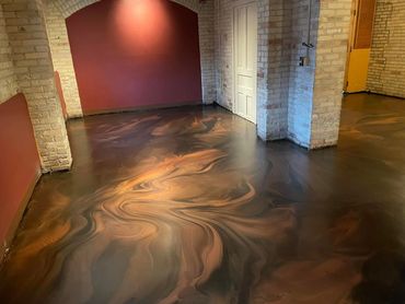 Commercial restaurant metallic floor installed by Full Spectrum Coatings in Traverse City, MI.