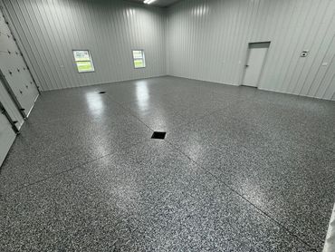Epoxy garage flooring installed by Full Spectrum Coatings in Honor, MI.