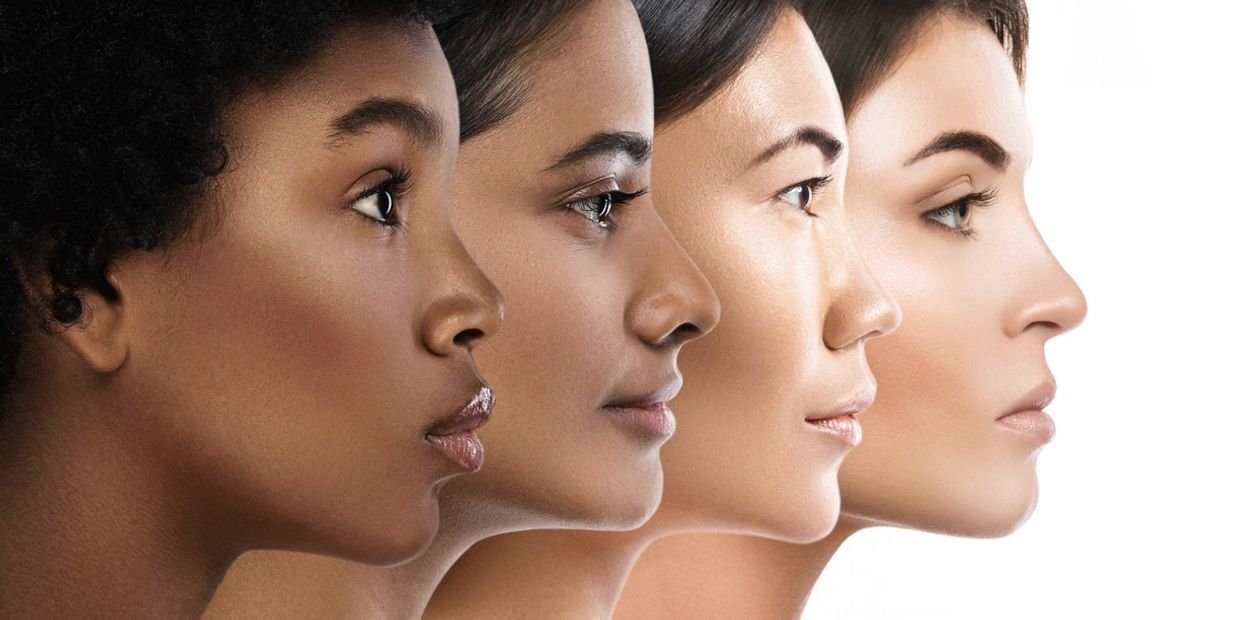 Profile views of four women with diverse skin tones and features.