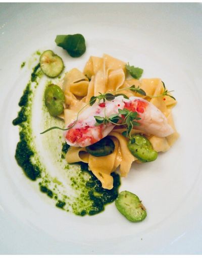House pappardelle, spinach pesto, sauteed fava beans, butter poached lobster.