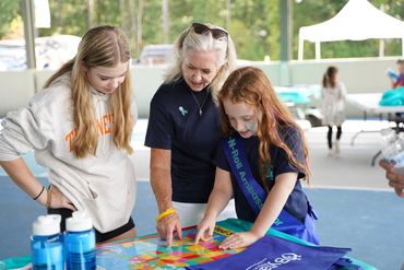 Student hosts leading activities at the Spina Bifida Walk-N-Roll in Charleston, SC