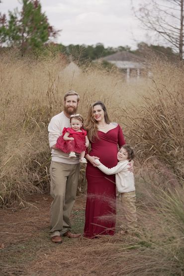 Smith family portrait in a tall grass field in Summerville, South Carolina