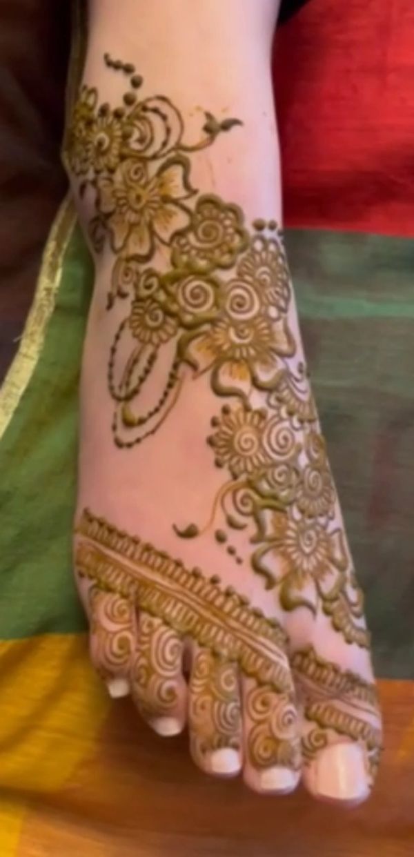 Full-coverage bridal henna design by a Southampton henna artist, detailed mehndi covers hands, arms,