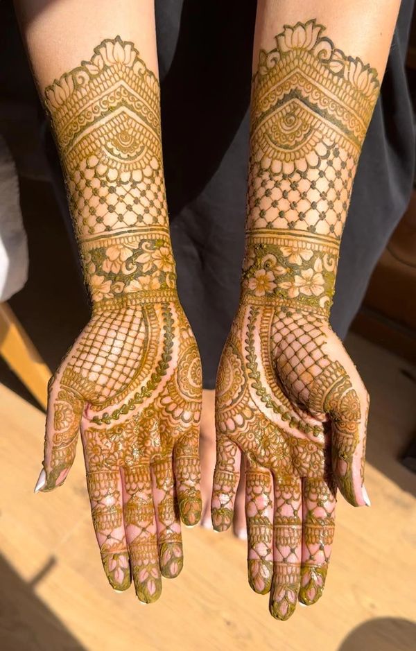 Full-coverage bridal henna design by a Southampton henna artist, detailed mehndi covers hands, arms,