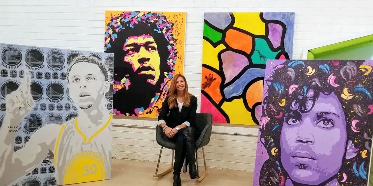 Victoria and her paintings at Vane Gallery. Prince, Steph Curry, Jimi Hendrix, Girafter the Rain