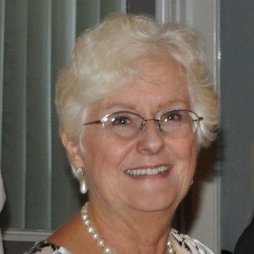 Judy Miranda, Secretary and photo website master