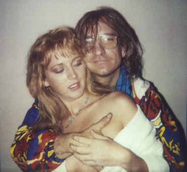 Kristin Casey and Joe Walsh, hotel room, drunk and hugging