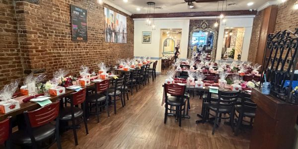 Elegant event setup in a cozy restaurant room.