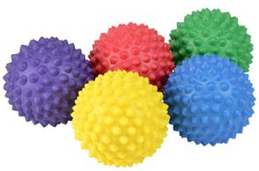 Five spikey massage balls each in different colours