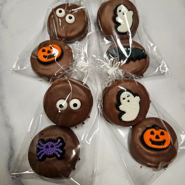 halloween decor on chocolate covered cream cookies