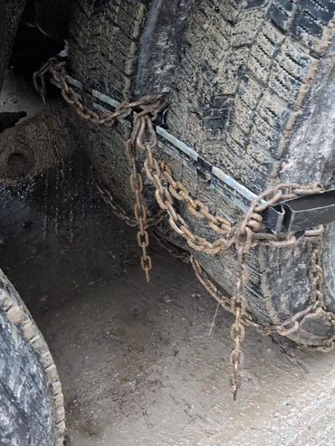 The chain tails are brought up to the driver's desired height, making them easy to connect.