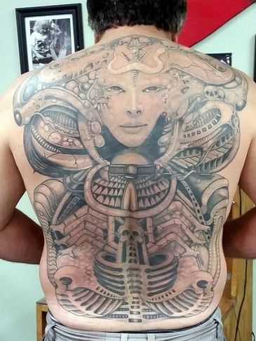 Full Geiger inspired back piece tattoo by Rockwood at Big Island Tattoo.