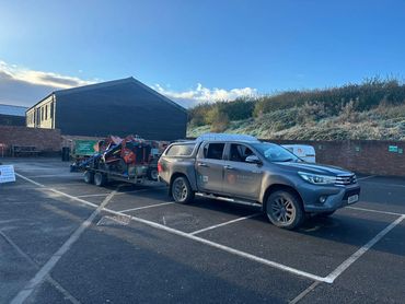 Knighton Countryside Management delivering one of their Ditch Witches to Dorset Studio School's Empl