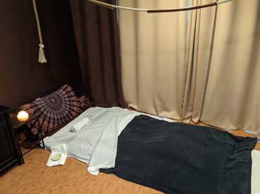 The massage mat for floor based work. Heated Tempur Pedic mat covered in warm blankets. relaxing