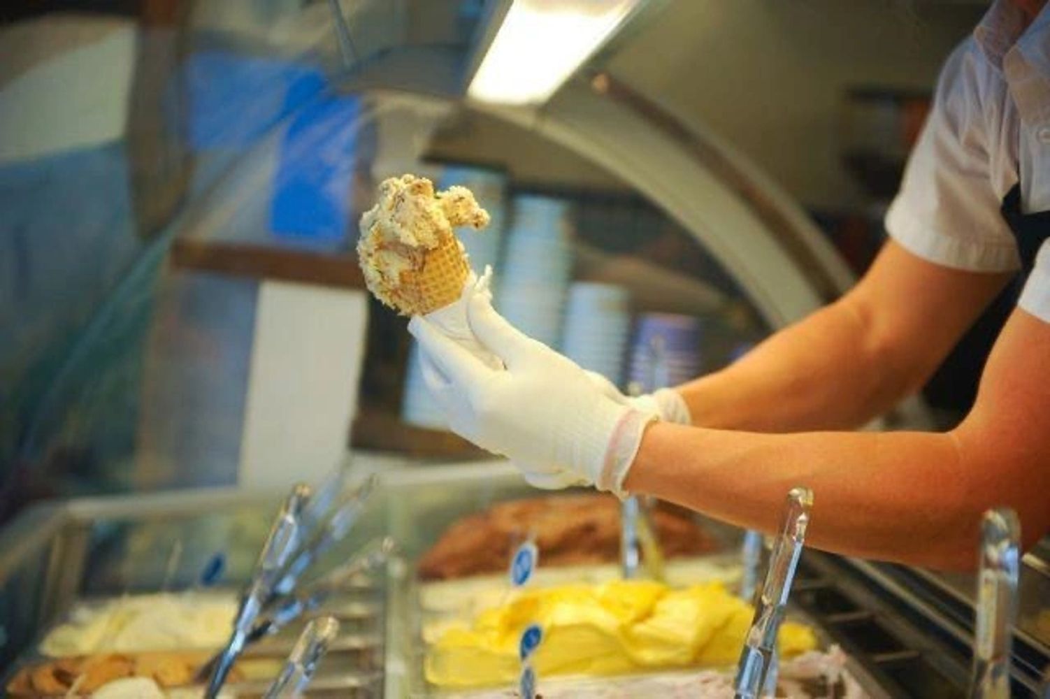Ice cream in a cone served at a mobile ice cream truck