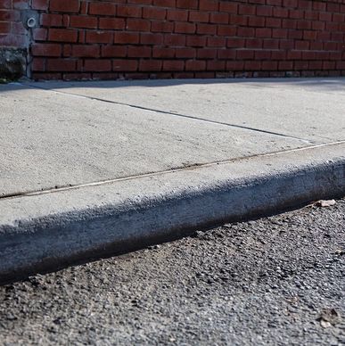Concrete curb and sidewalk