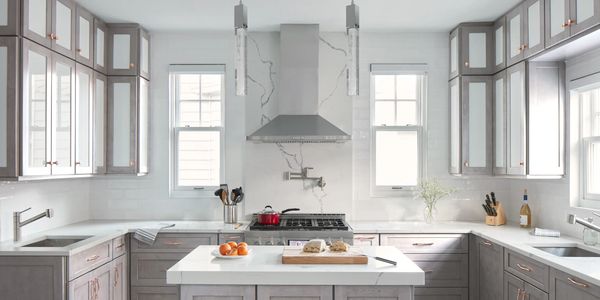 Tuscany Muratti Shaker cabinets with quartz countertops in a light kitchen