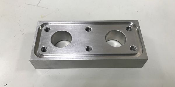 CNC milled stainless steel mounting block